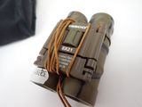 a close up of a pair of binoculars on a table
