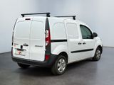 a white van that is parked in a room