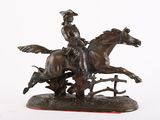 statue représentant un homme à cheval, avec un chien qui court derrière lui