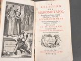 a book with a picture of a man holding a sword