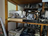 many different types of sewing machines in this room