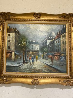 une photo d'un tableau accroché au mur