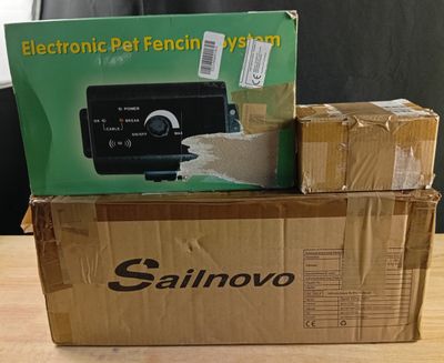 a box of electronics sitting on top of a desk