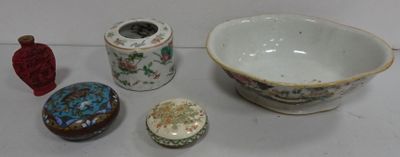 a bowl, a bowl, and a container sitting on a table