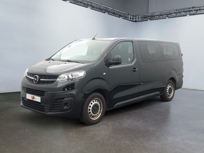 a picture of a black van parked in a garage