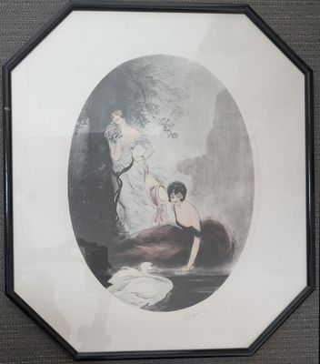une vieille photo représentant une femme et un enfant, dans un cadre noir