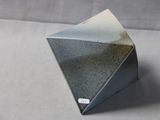 a small gray object that is sitting on a table
