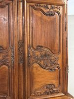 Important buffet à deux-corps en chêne mouluré et sculpté à … (photo 3)