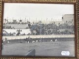 three framed photographs of horses and jockeys at a horse race