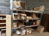 many boxes and boxes on the shelves in the garage