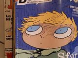 a magazine with a picture of a boy on the cover