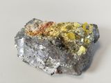 a piece of metal that is sitting on a table