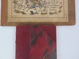 a red book with a picture of a man riding a horse