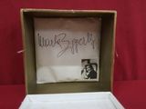 a box that has a picture of a man in it