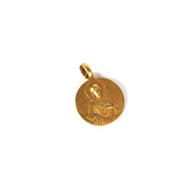 une pièce d'or à l'effigie de Jésus