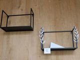 two shelves that are on the floor next to each other