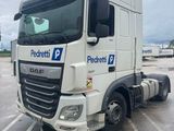 a picture of a white truck parked in a parking lot