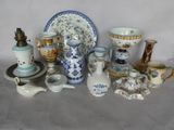 many different types of vases and dishes on the table