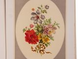 an open book with a picture of a bunch of flowers on it
