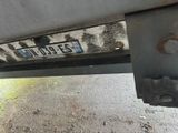 a close up of a license plate on a truck
