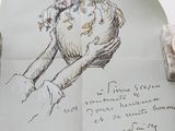 a piece of paper with a drawing of a cat holding a flower pot