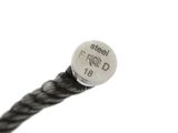 a close up of a cable with a button on it