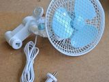 a white fan that is sitting on the floor