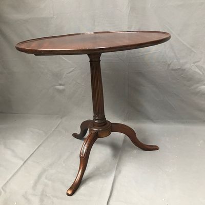 an old wooden table with a wooden top on a white background