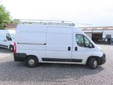 a white van that is parked in a parking lot