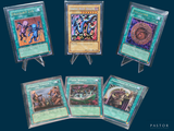 several cards are on display in plastic holders on a blue background