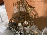 a table that has a bunch of glass items on it