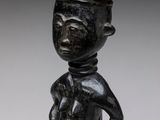 an image of a statue of a man with a hat on his head