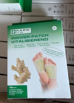 a box with a picture of a person ' s foot with a bandage on it