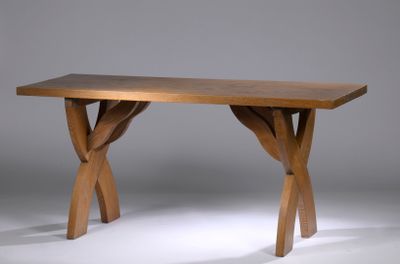 an image of a wooden table on a grey background
