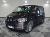 a brown van that is parked in a room