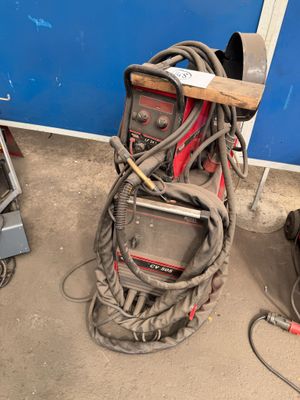 a lot of welding equipment that is sitting on the ground