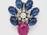 a ruby, sapphire and diamond cluster ring