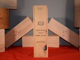 many wooden boxes stacked on top of each other on a table