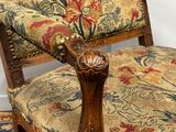 an image of a chair with a floral upholstered seat