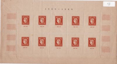 an old sheet of red stamps with portraits of people on them
