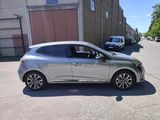 a silver car parked on the side of the road