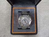 a watch that is in a box on a table