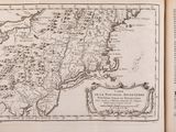 an open book with a drawing of a map on it