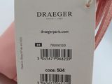 a pink bag with a tag on it sitting on a table