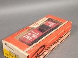 an image of a box with a cassette in it sitting on a table