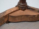 a close up of a table with a wooden top