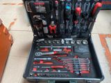 many tools in a tool case on the floor