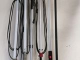 a bunch of tools hanging on the wall next to each other