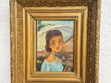 painting of a woman with a parasol on a wooden easel