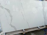 a large slab of marble sitting on a pallet